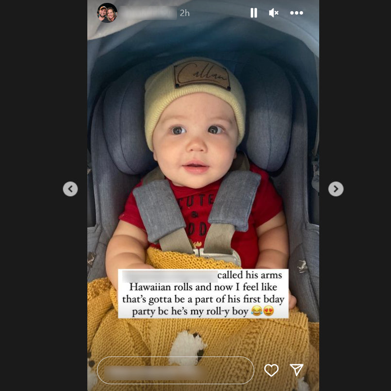Baby boy in a car seat with his coffee milk pima cotton Sheep Dreamzzz baby blanket.