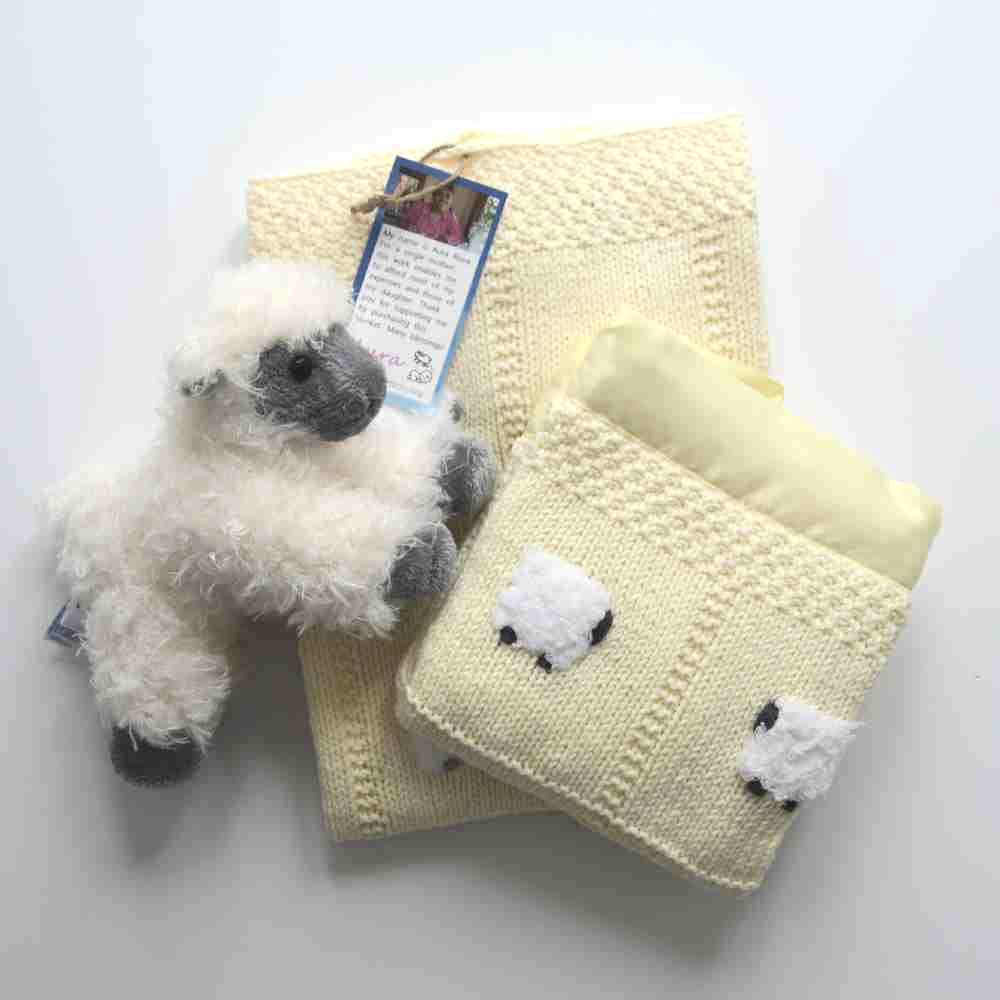 Yellow baby blanket gift set.