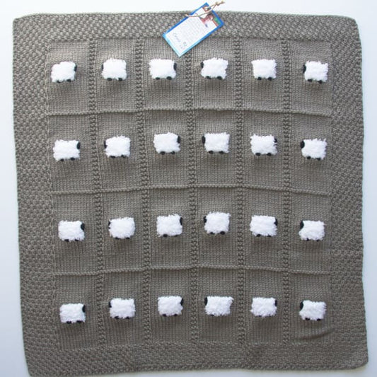 Dark gray/brown handmade baby blanket with 24 fluffy white sheep