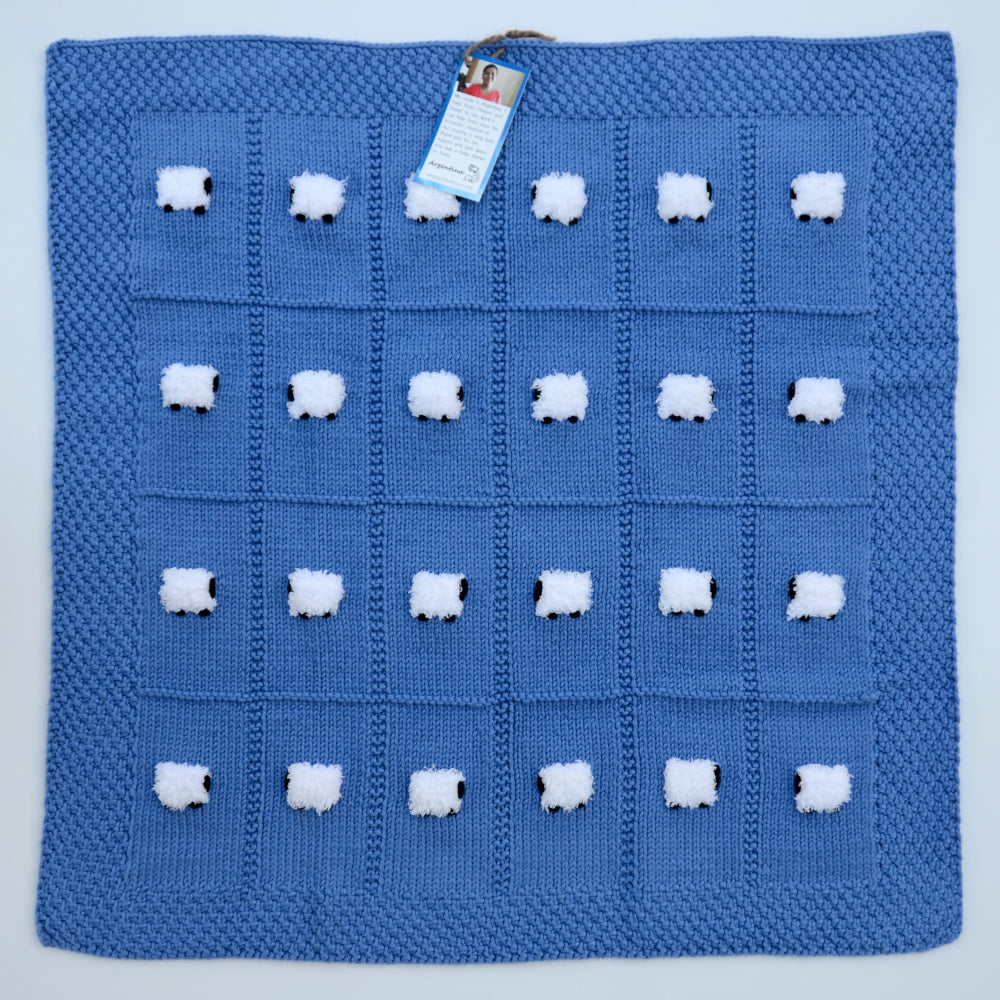Cornflower blue baby blanket with 24 fluffy sheep.