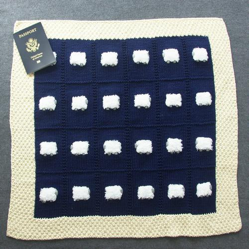 Navy blue blanket with cream border