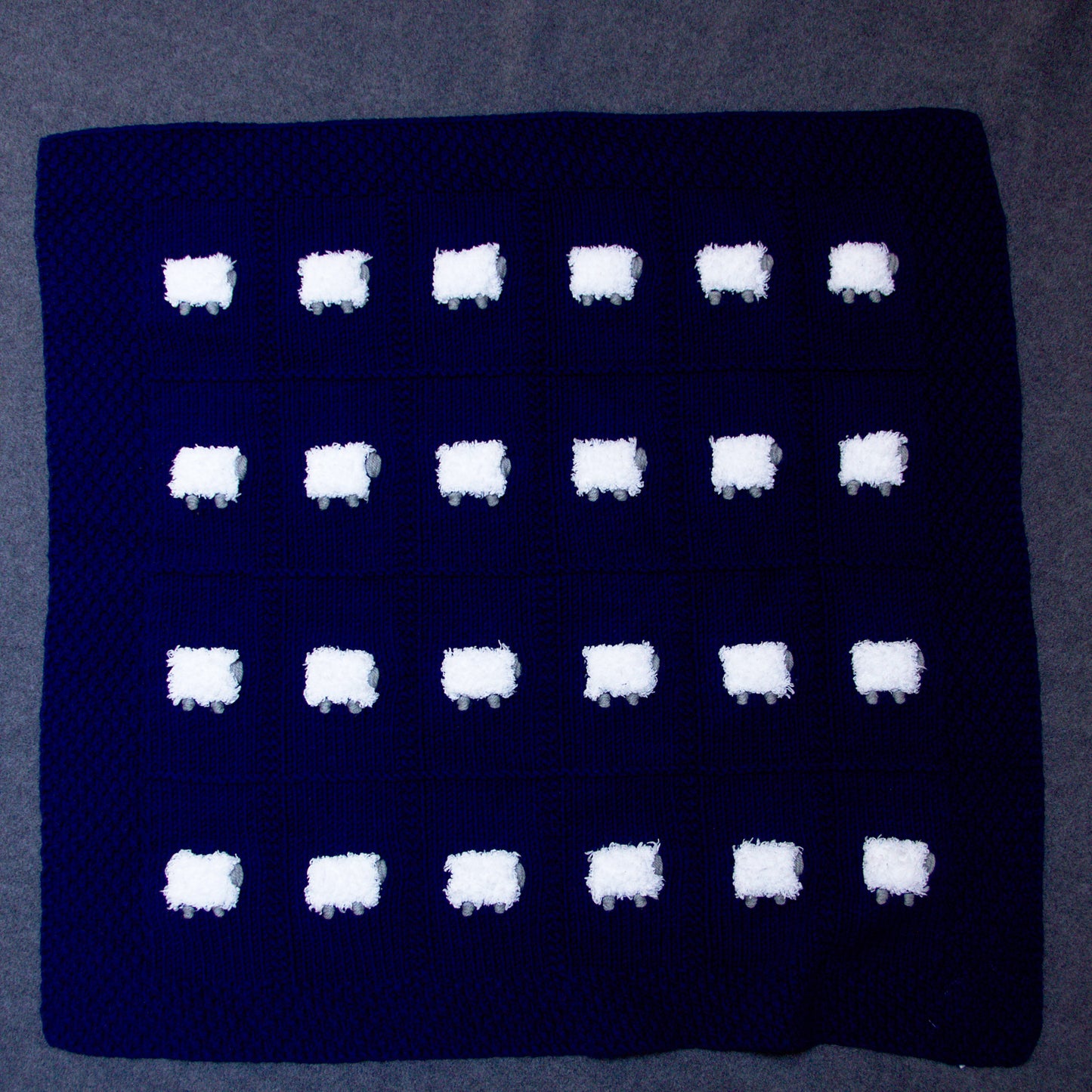 Mostly cotton navy baby blanket, hand-knitted