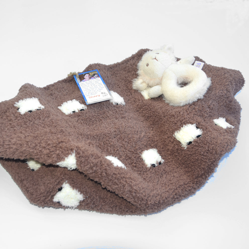 Fleece baby blanket with fluffy sheep. It is brown.