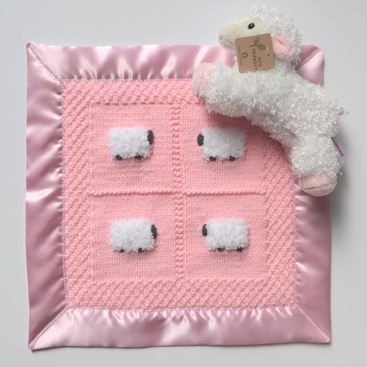 Peach pink lovey security blanket, hand-knitted, with a fluffy sheep doll