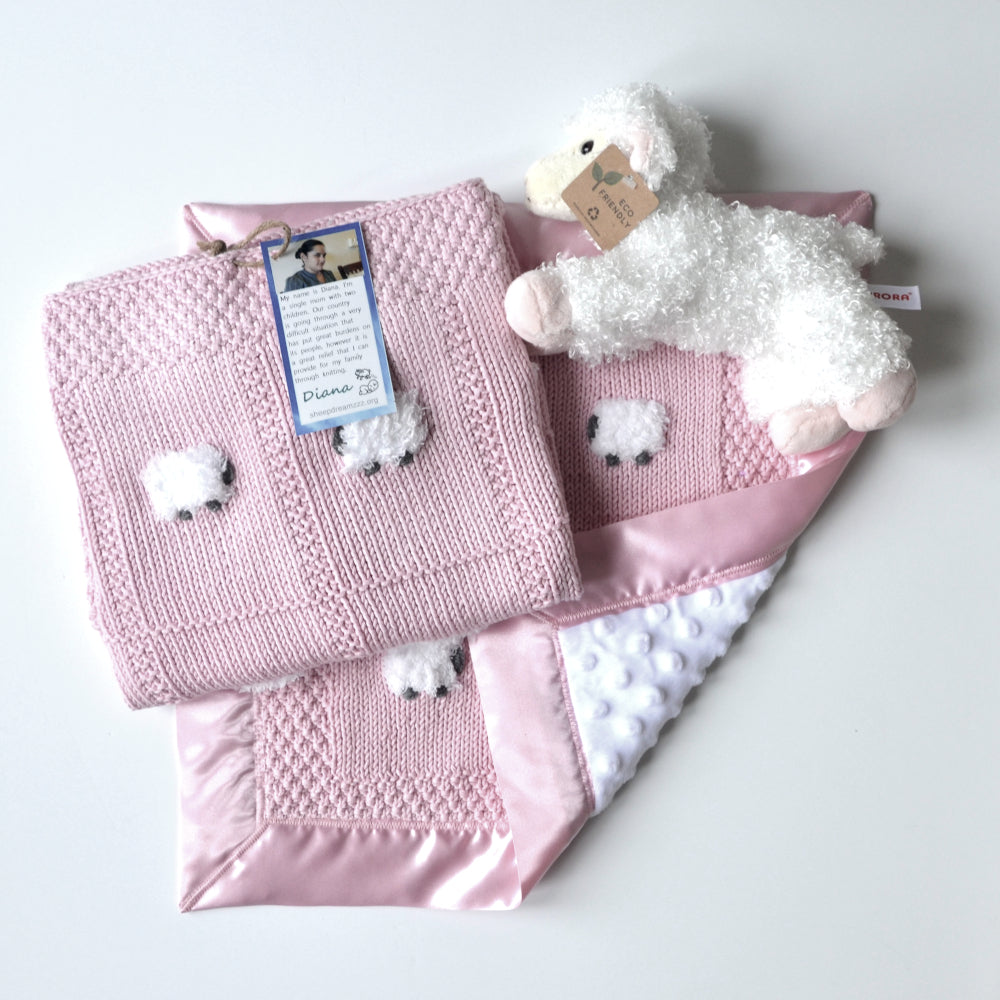 Pink baby blanket gift set with blanket, lovey, and sheep doll