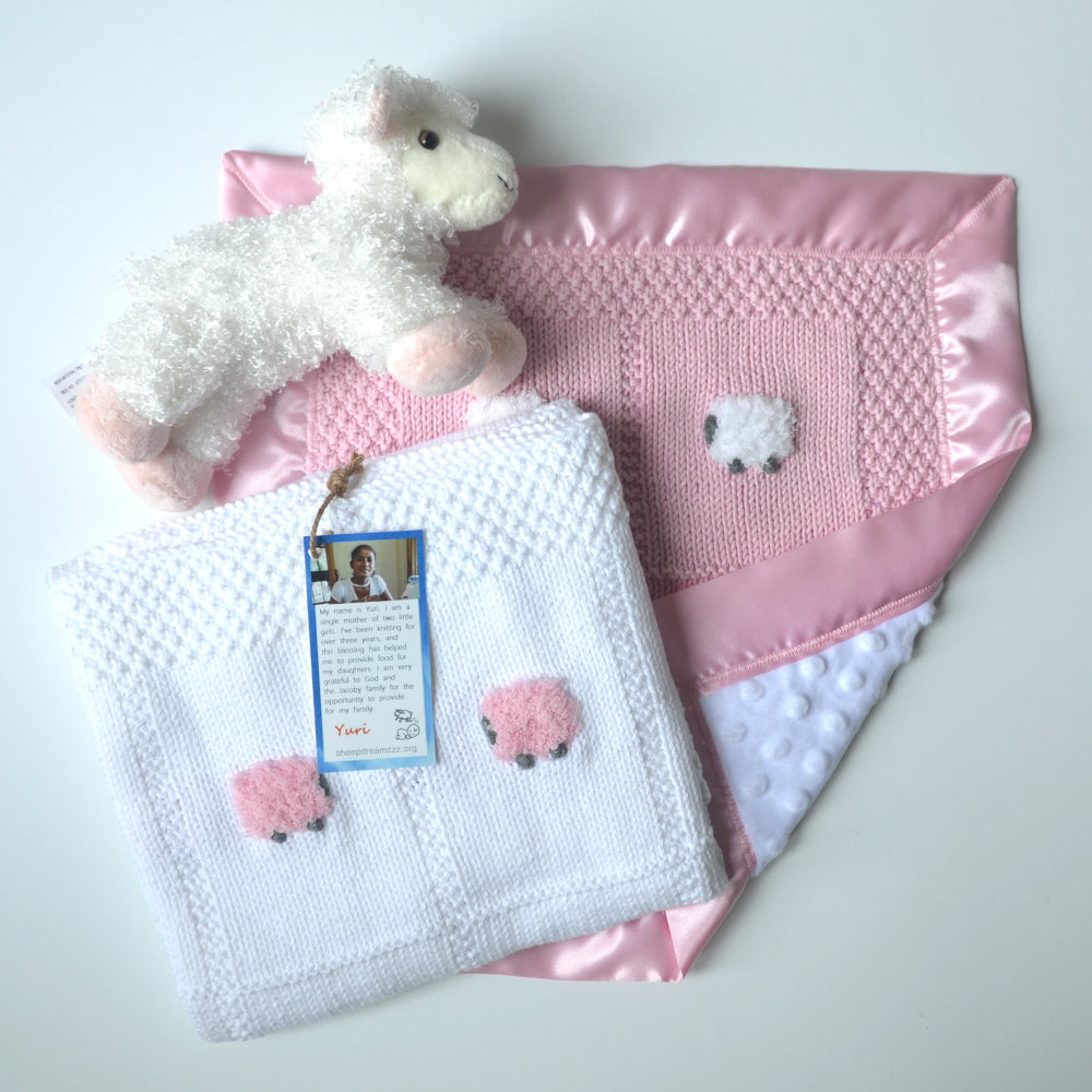 Pink and white baby blanket gift set, hand-knitted.