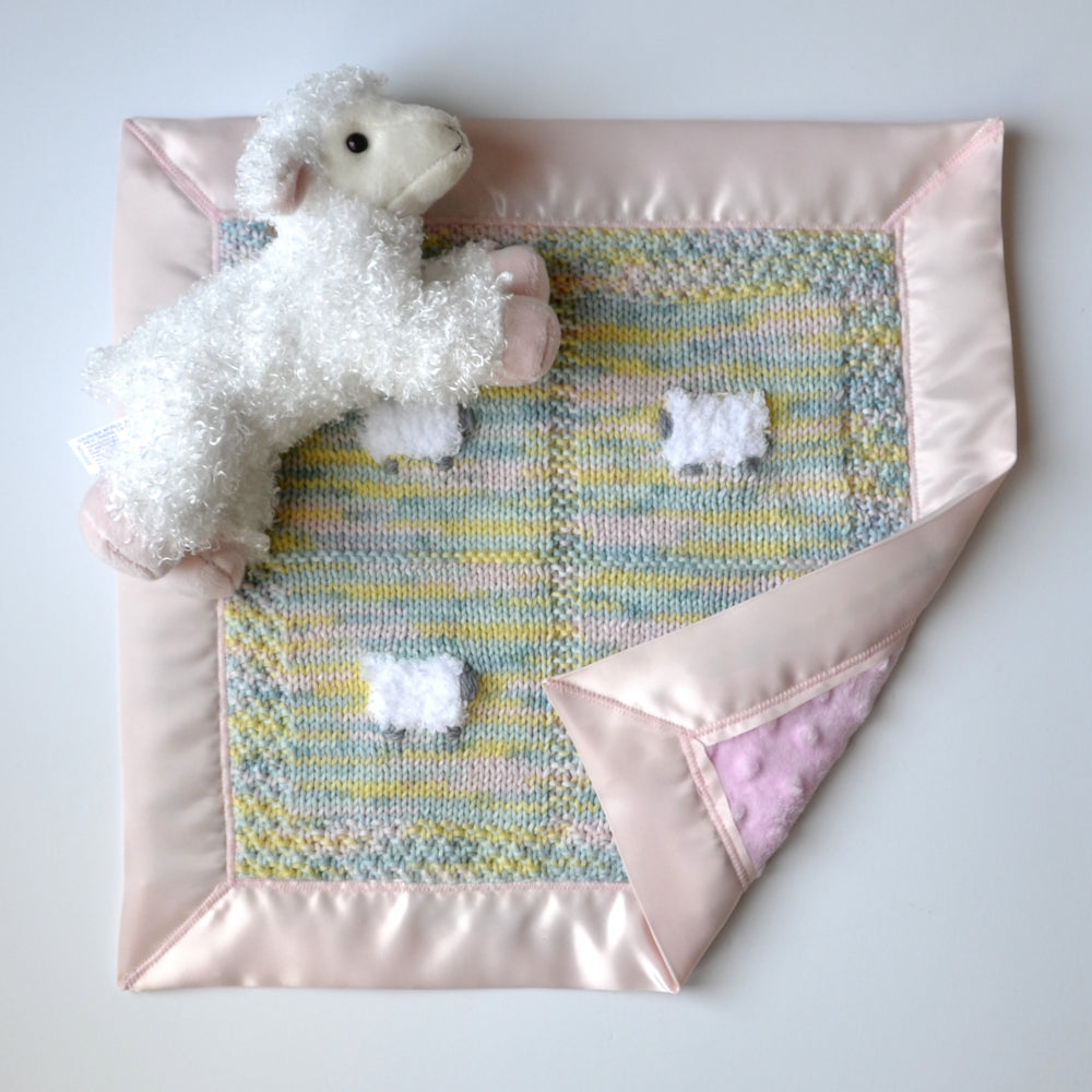 Multicolor baby lovey with pink, green, aqua, and more.