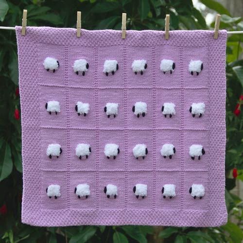 Lavender baby blanket with 24 fluffy white sheep