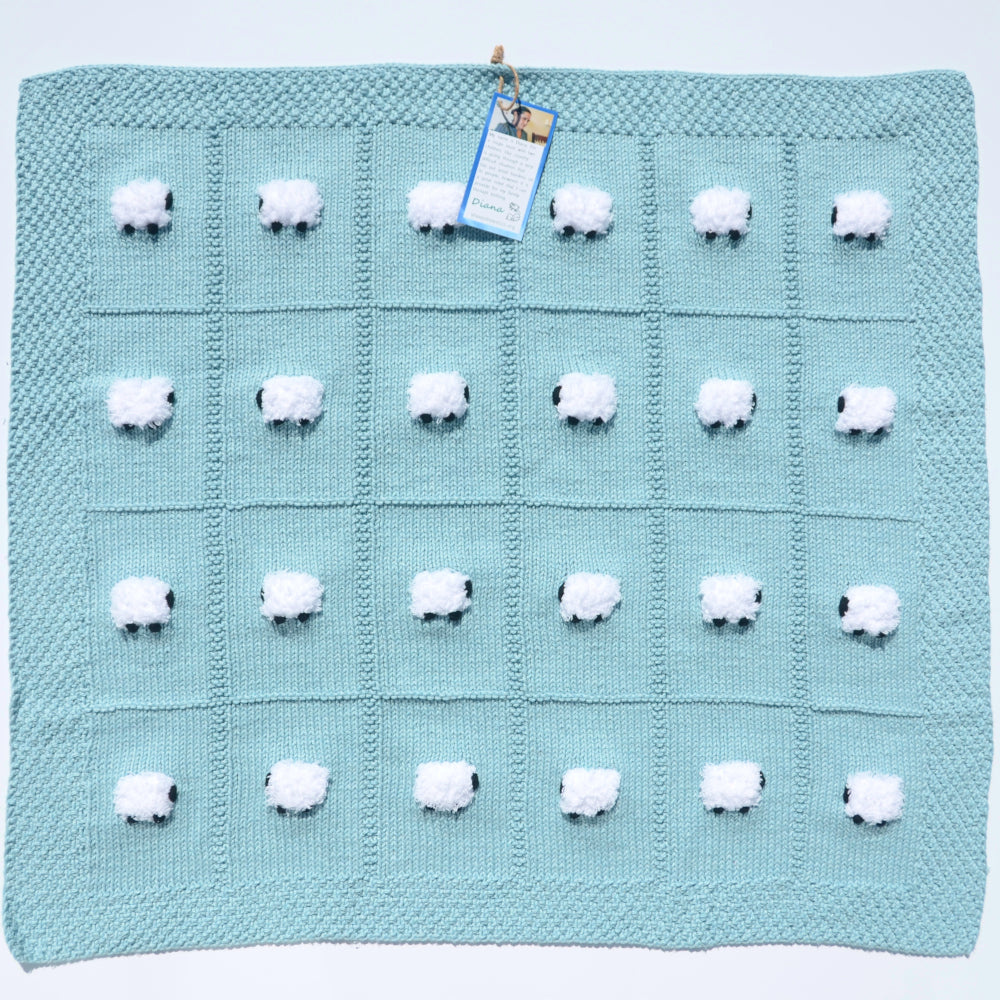 Artic blue baby blanket. It's all-pima cotton with 24 fluffy sheep.