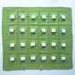 Mostly cotton hand-knitted baby blanket with 24 fluffy white sheep. The color of the blanket is elms green.