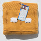 Goldenrod (yellow/orange) hand-knitted baby blanket.