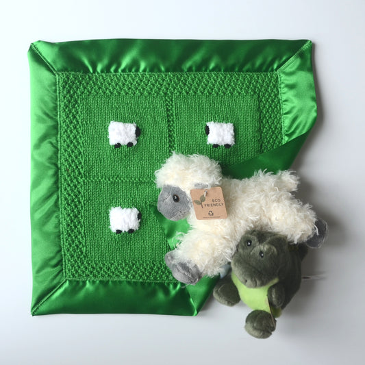 Handmade emerald green lovey security blanket with a fluffy doll.