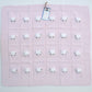 Pale pink baby blanket hand-knitted with 24 sheep.