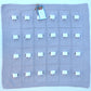 Periwinkle baby blanket with 24 sheep.