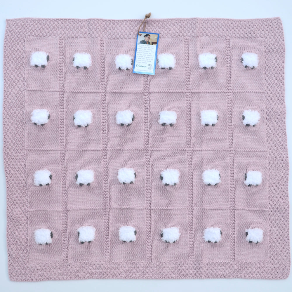 Pastel pink baby blanket (called Rose Quartz) with 24 fluffy sheep.