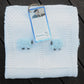 White pima cotton blanket with blue sheep. Hand-knitted.