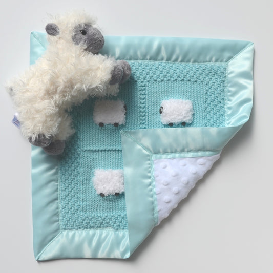 Baby lovey in soft turquoise with a fluffy sheep doll