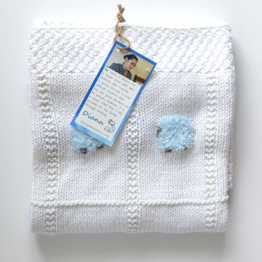 Brilliant white baby blanket with fluffy blue sheep