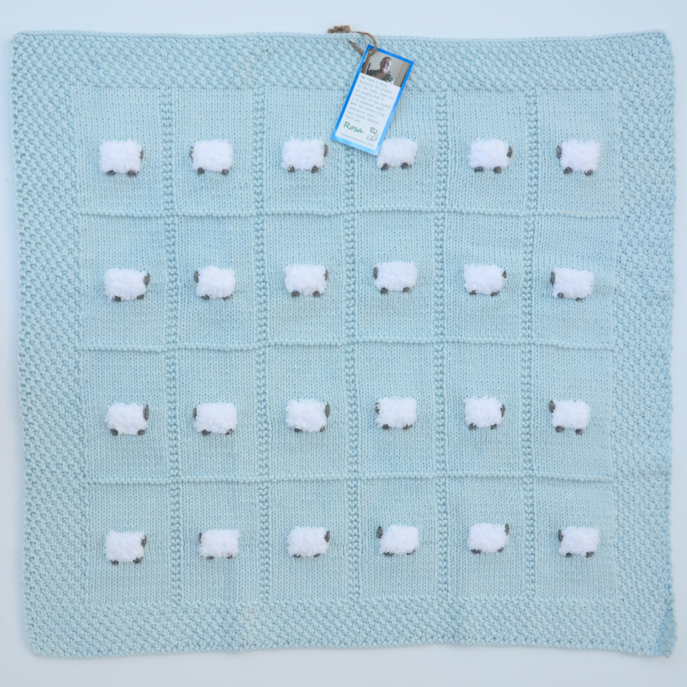 Baby blue baby blanket with 24 fluffy white sheep.